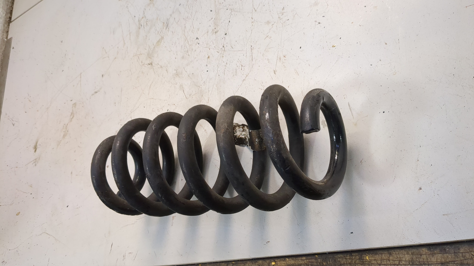 Пружина задняя