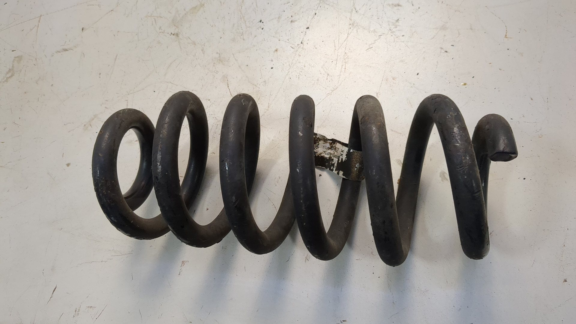 Пружина задняя