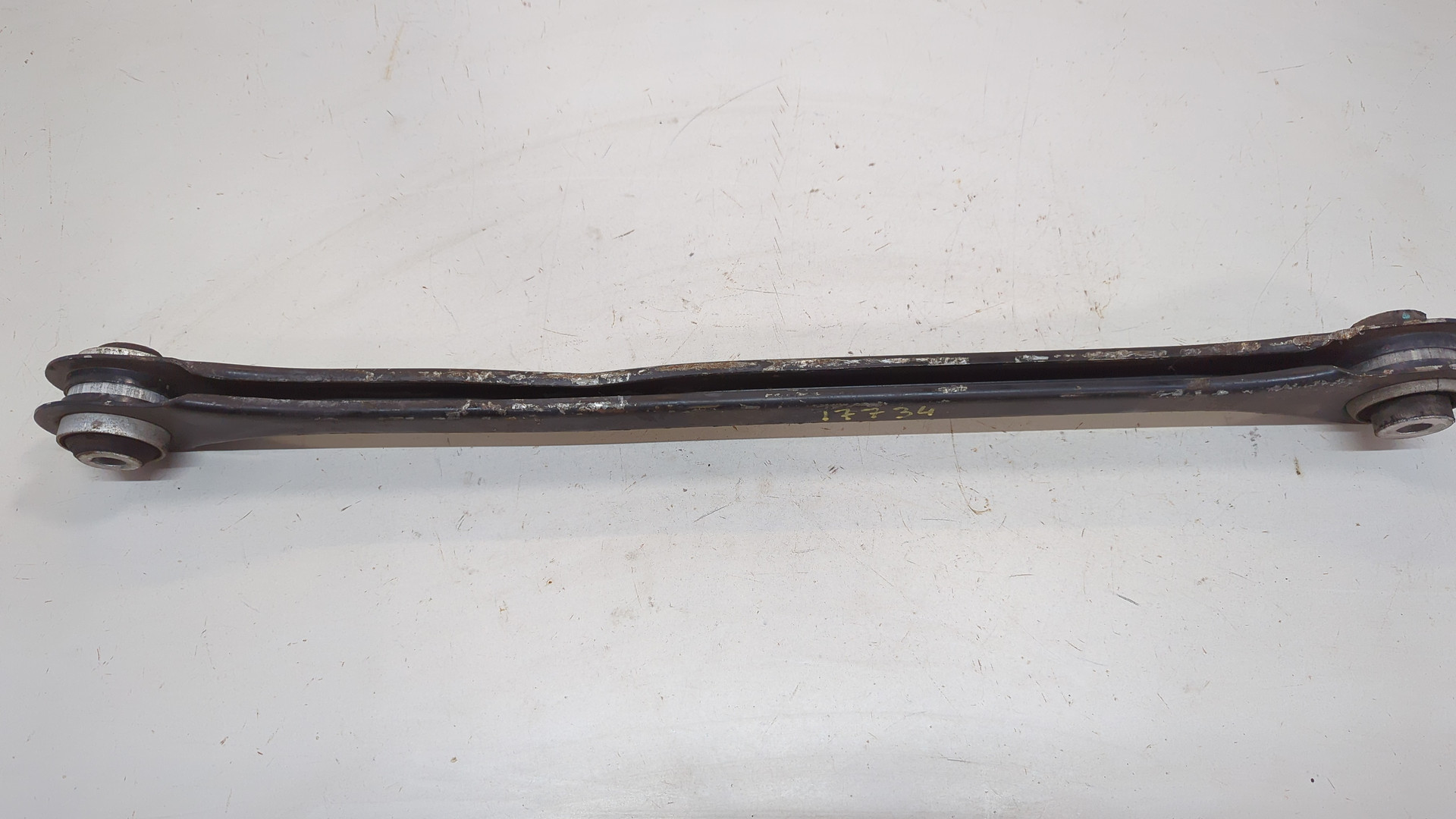 Рычаг задний