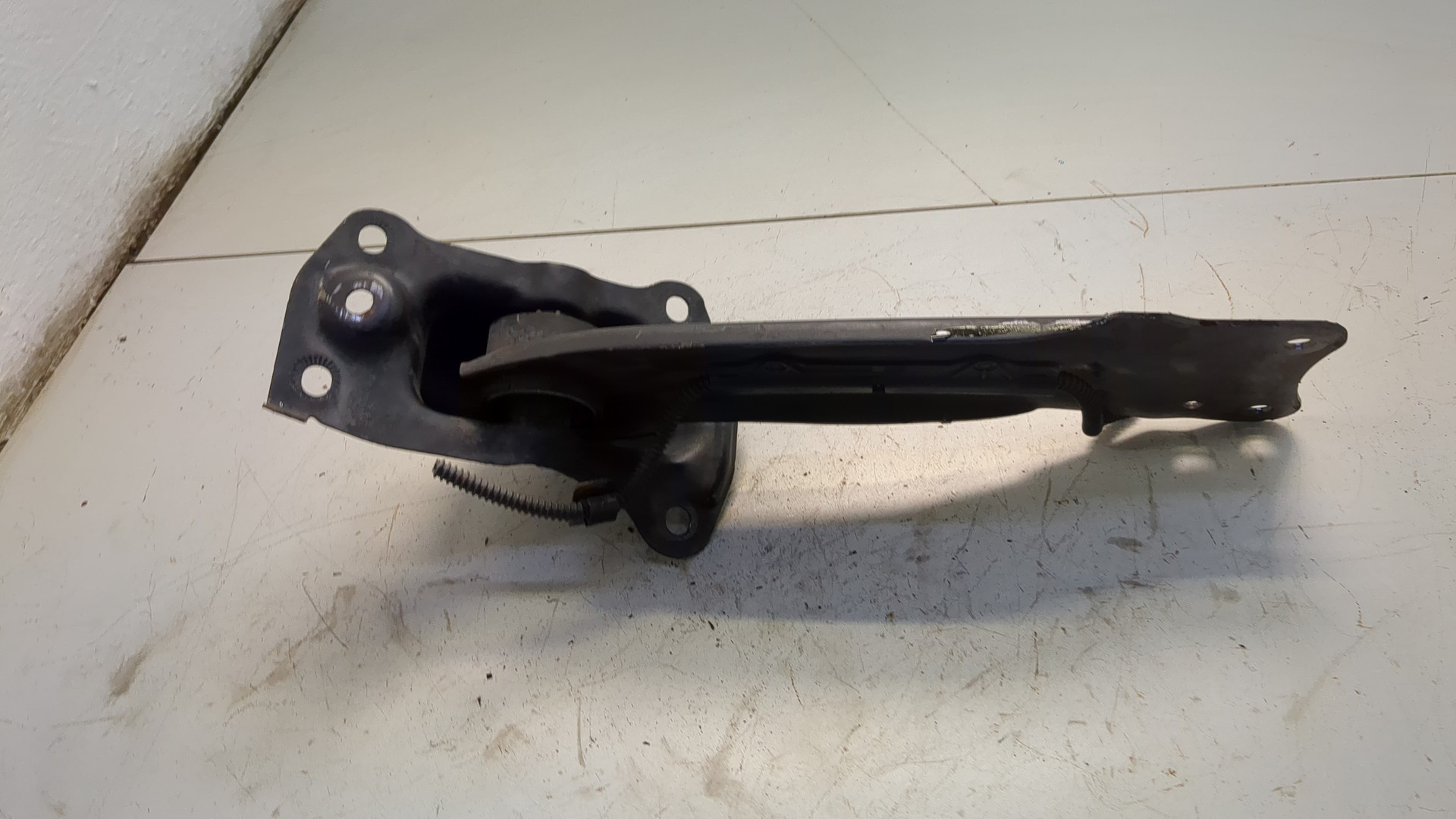 Рычаг задний левый