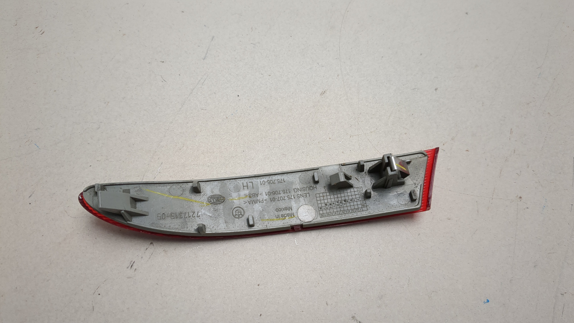 Отражатель в бампер задний левый