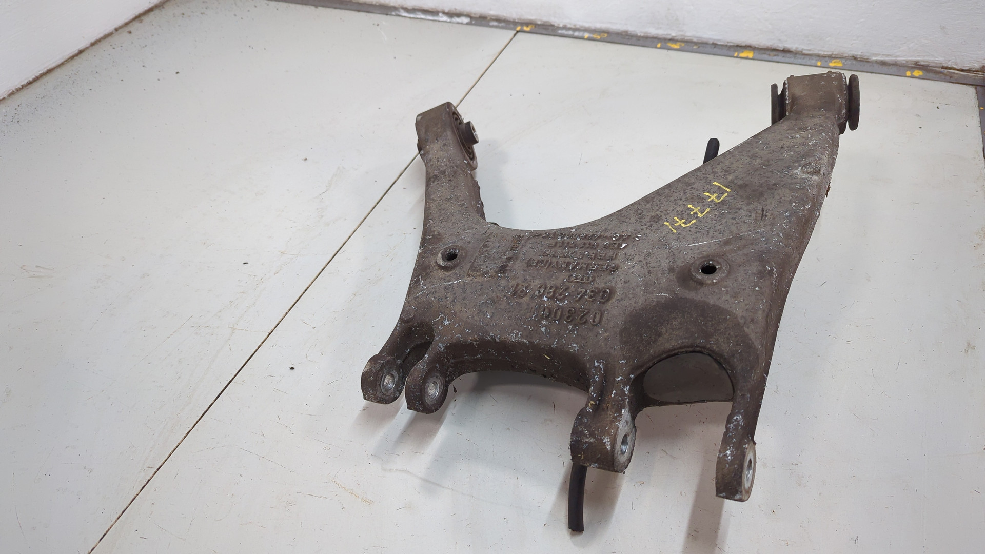 Рычаг задний левый