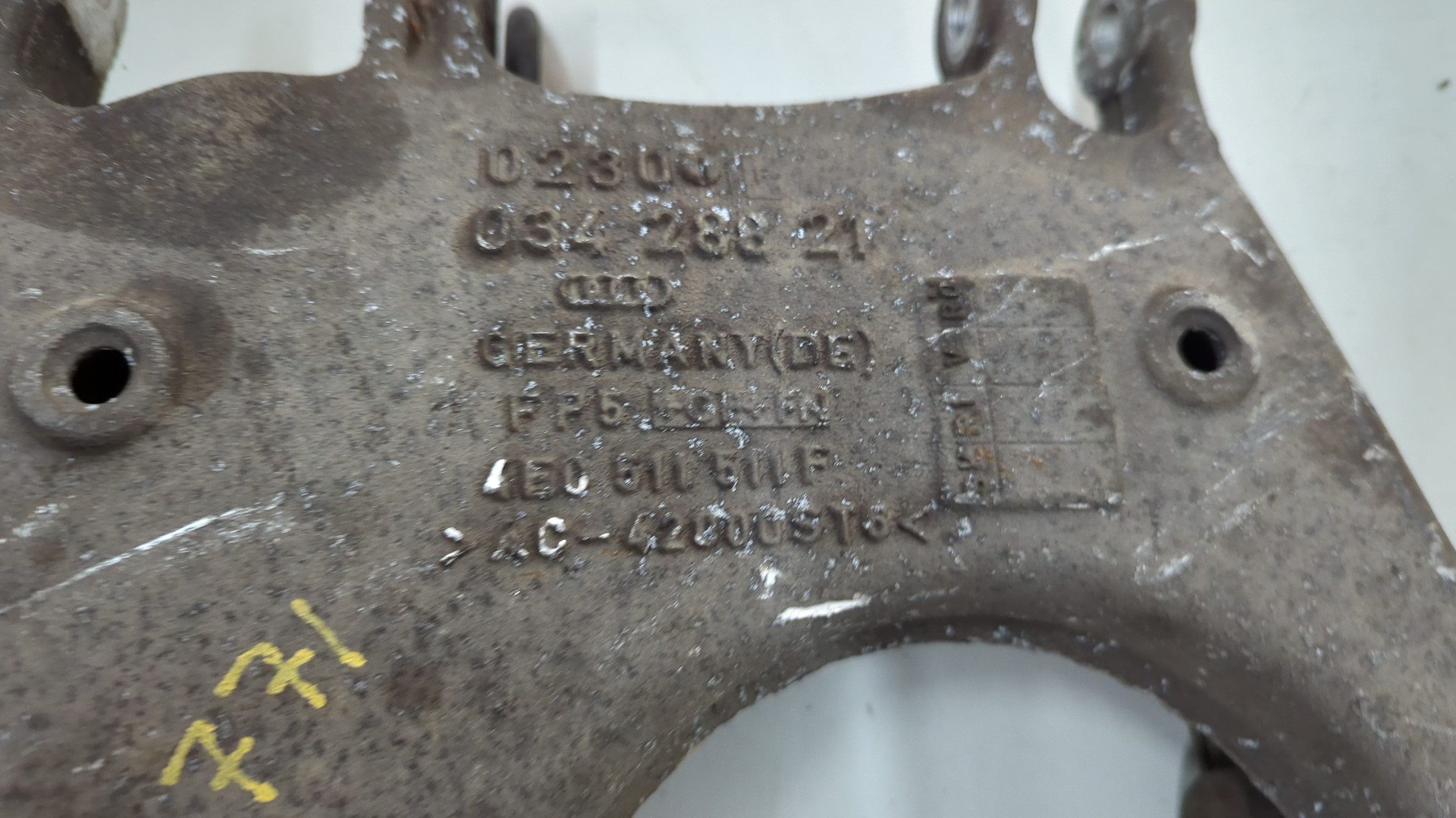 Рычаг задний левый