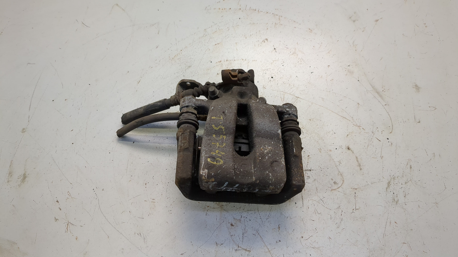 Суппорт задний левый