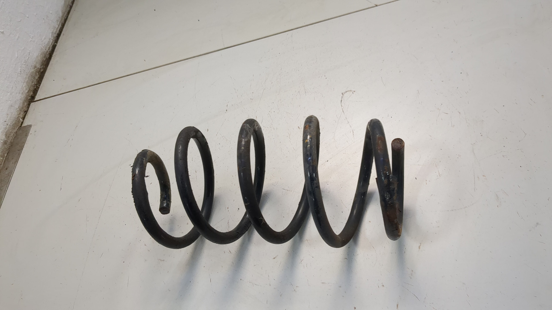 Пружина передняя