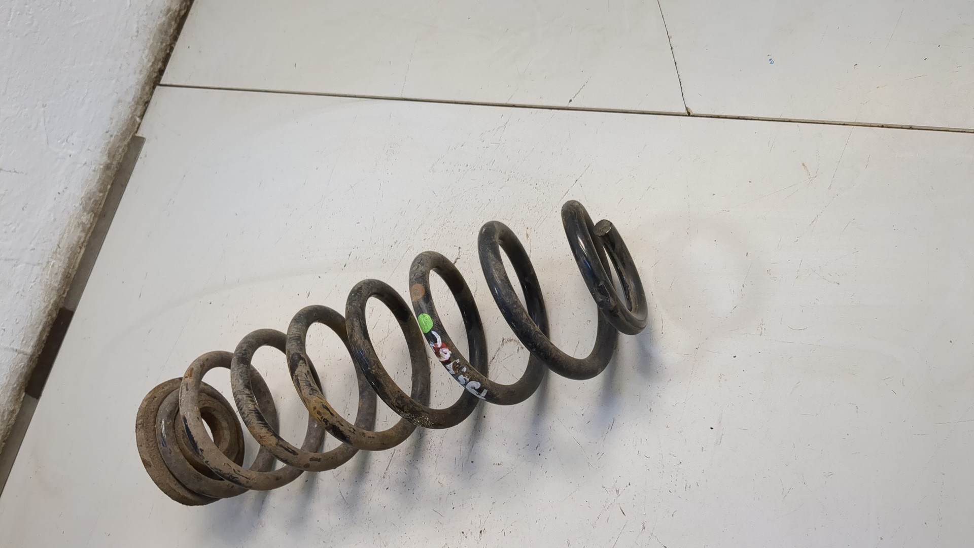 Пружина задняя