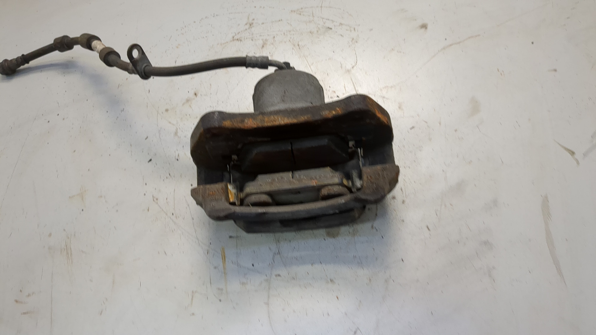 Суппорт передний левый