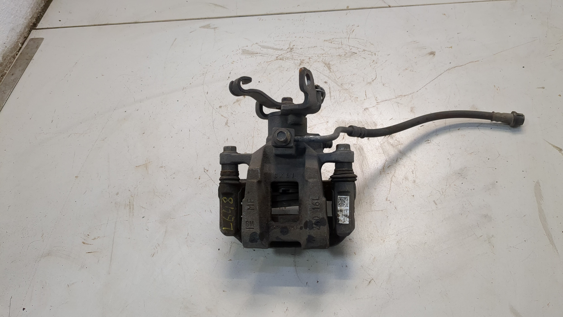 Суппорт задний левый