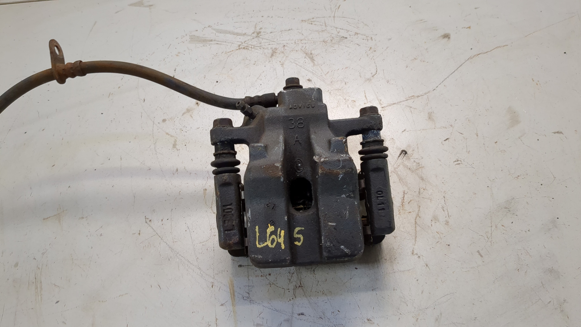 Суппорт задний левый