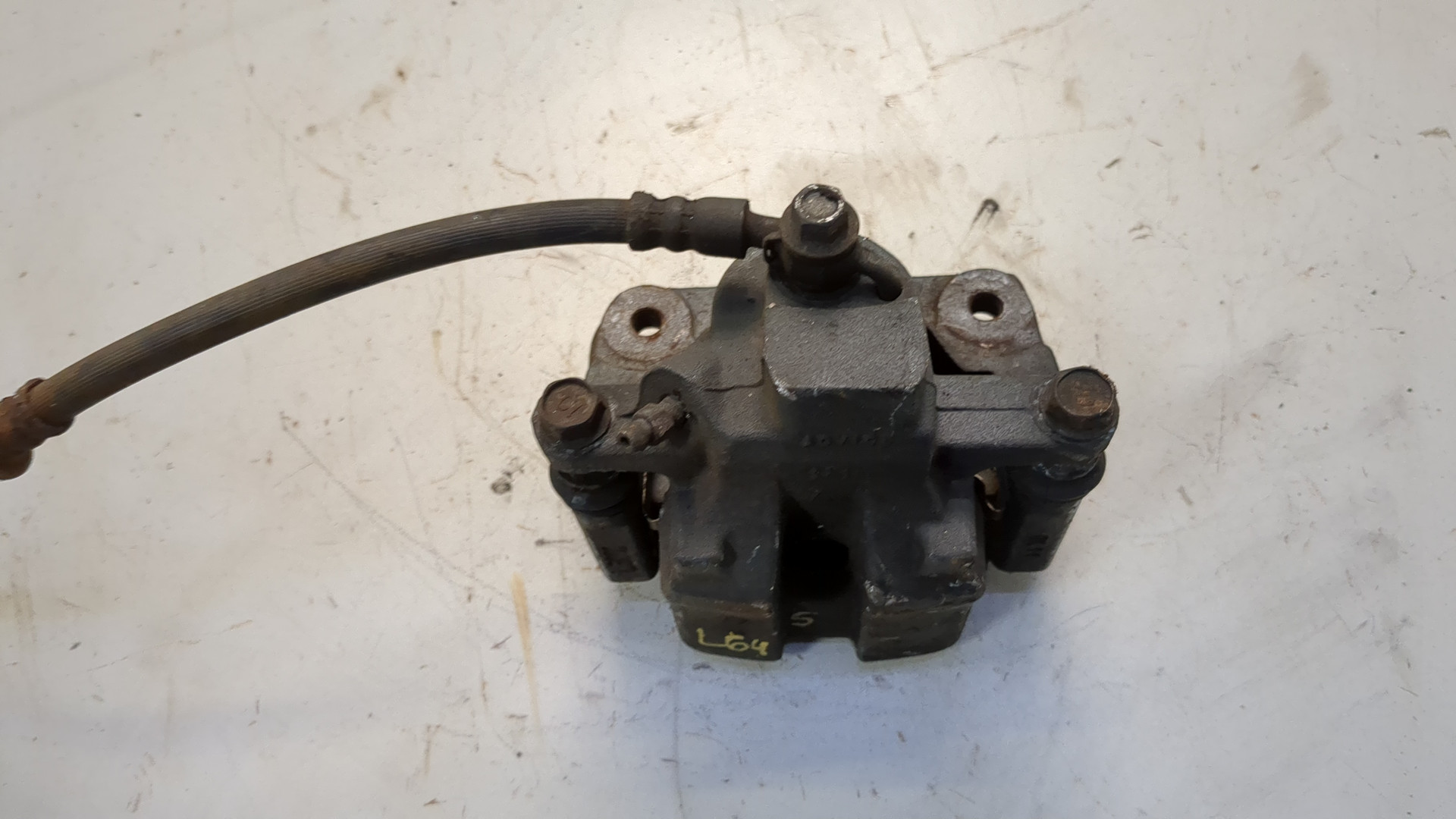 Суппорт задний левый