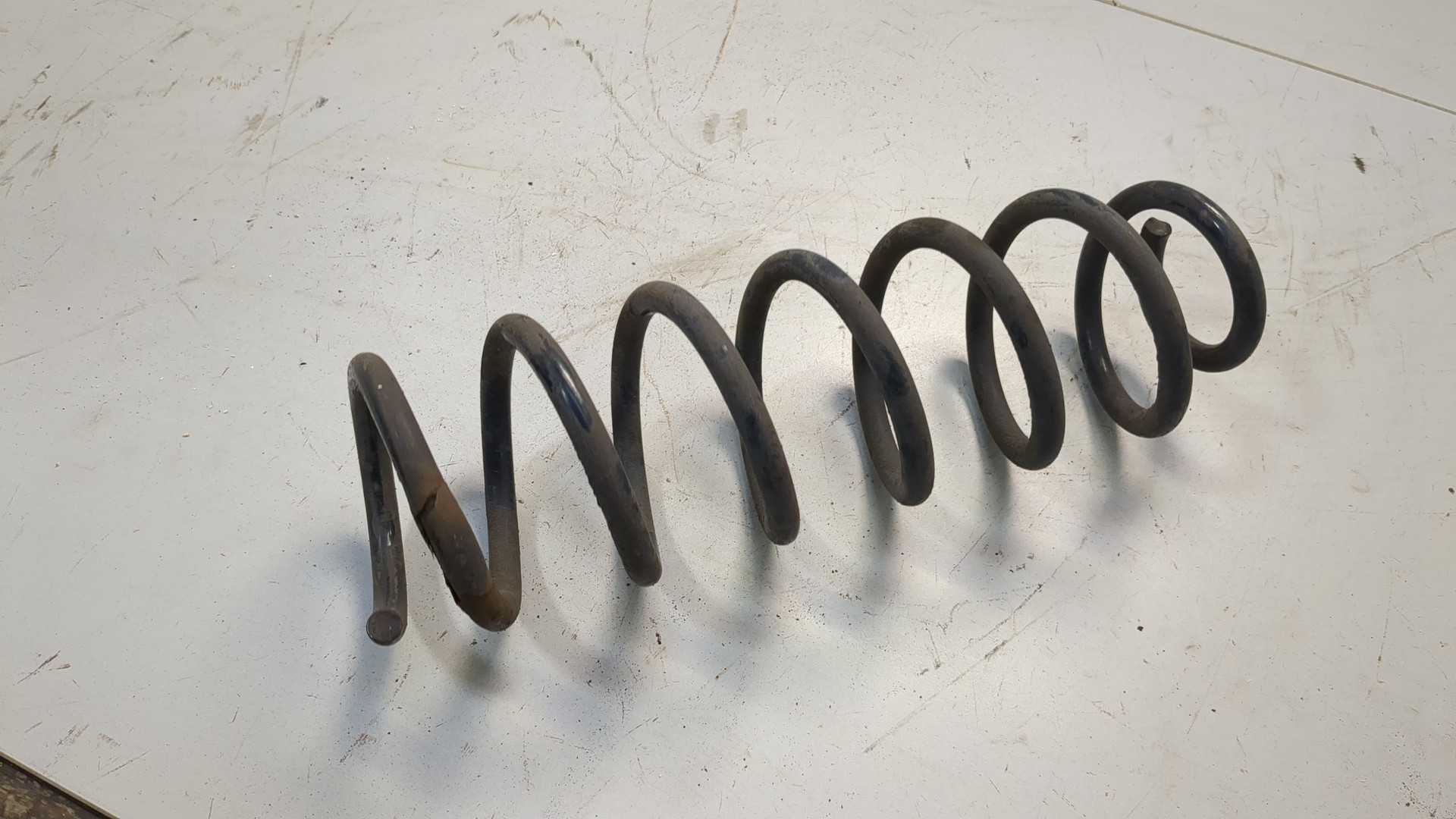 Пружина задняя