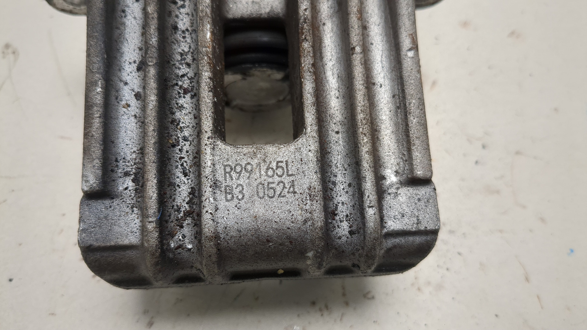 Суппорт задний левый