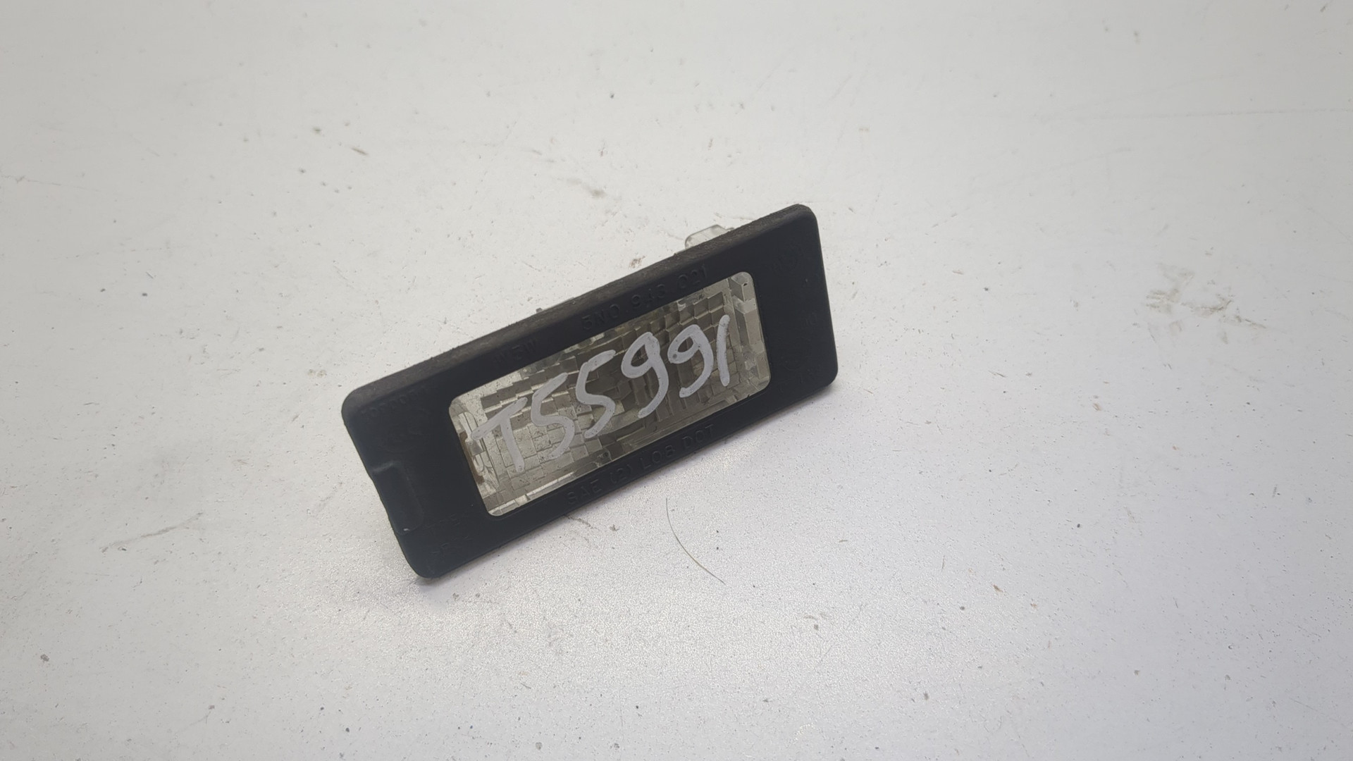 Фонарь подсветки номера