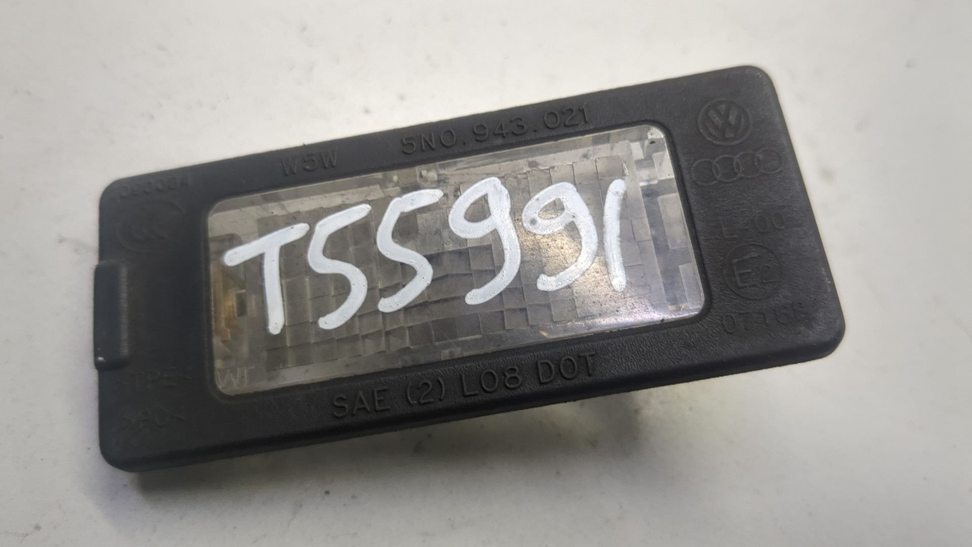 Фонарь подсветки номера