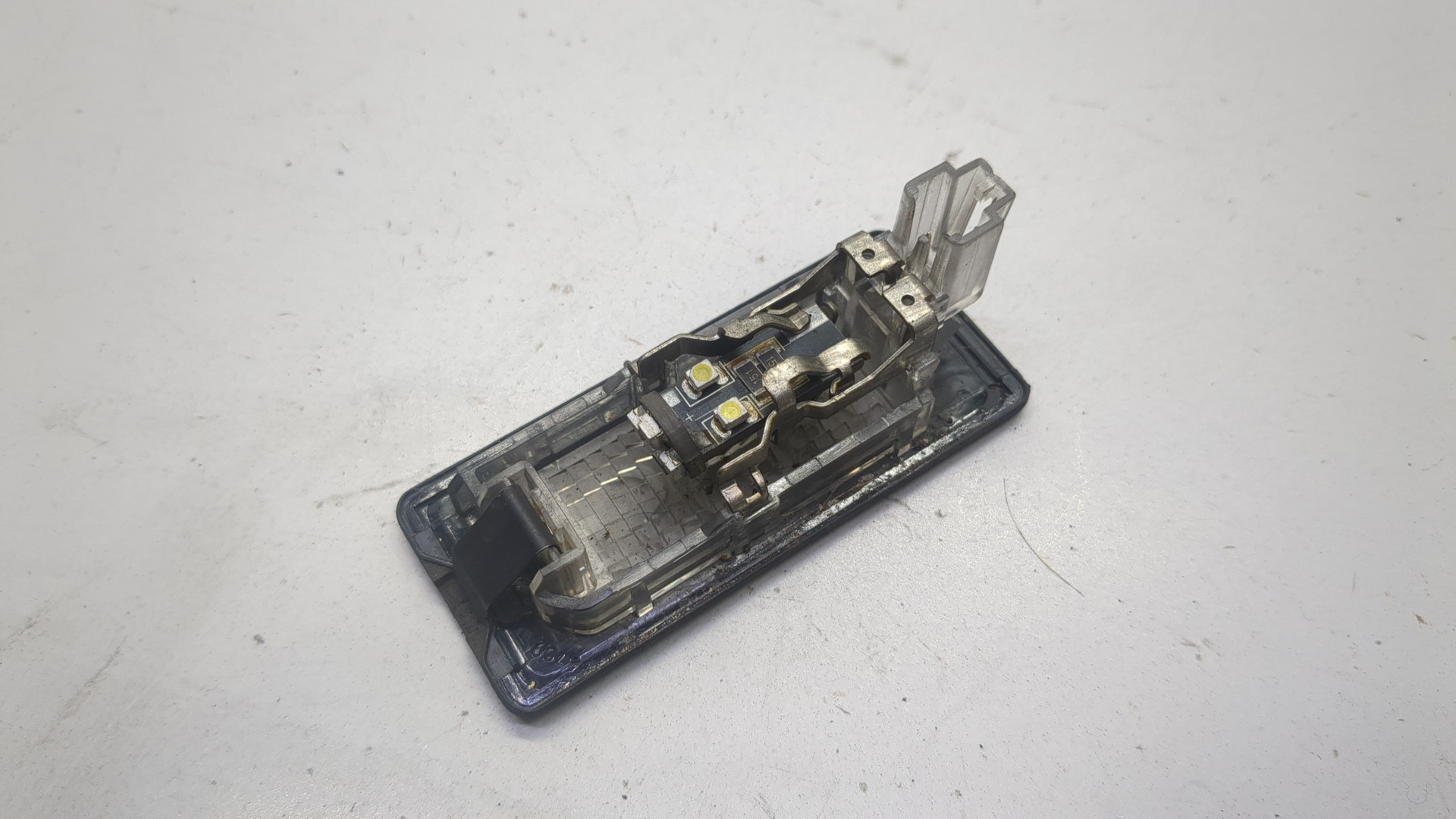 Фонарь подсветки номера