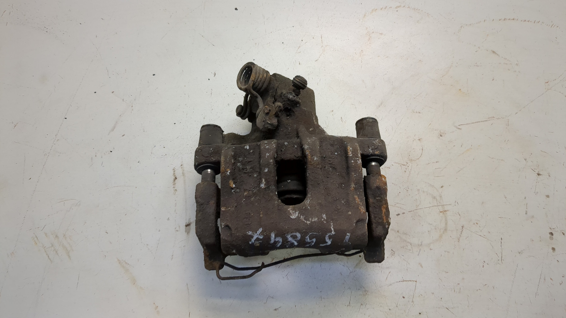 Суппорт задний левый