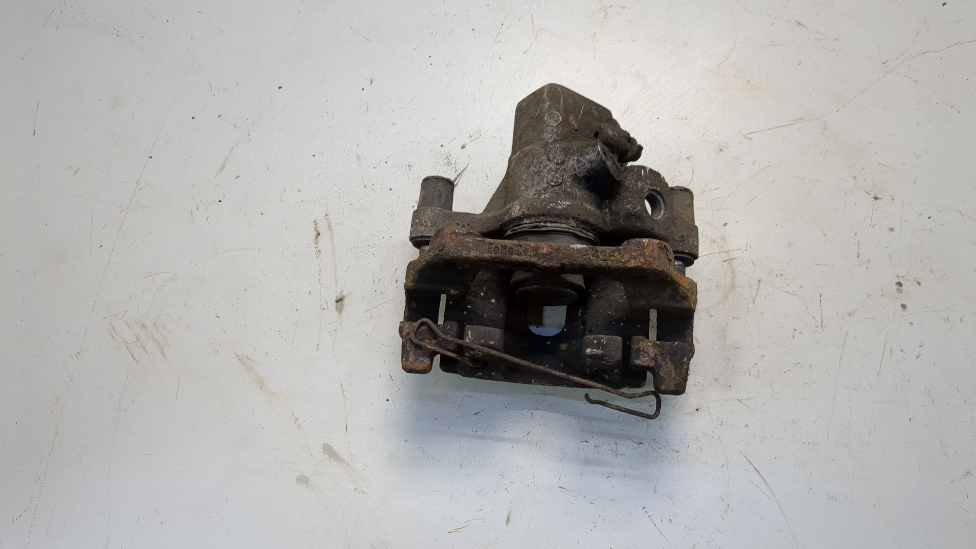 Суппорт задний левый