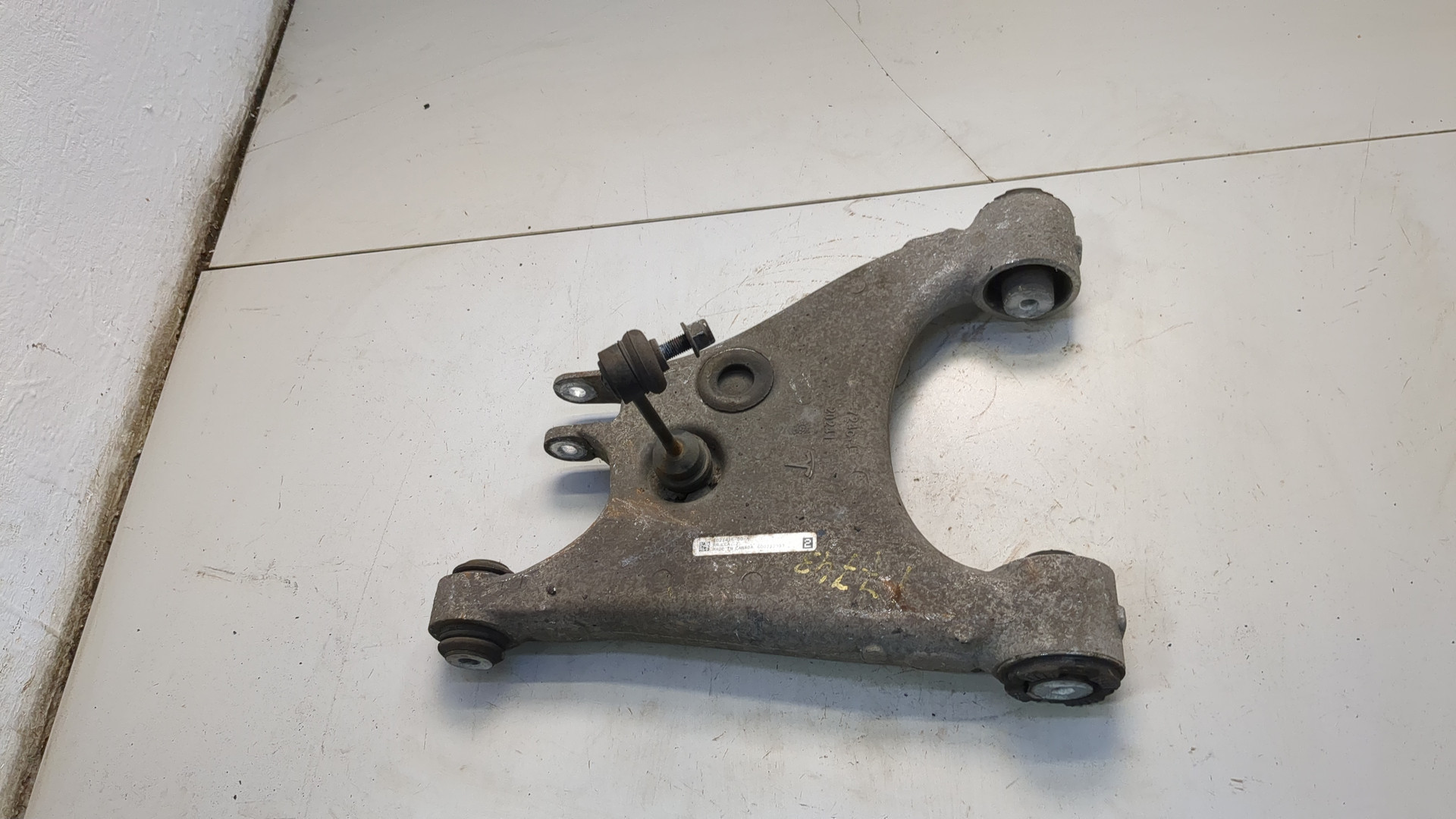 Рычаг задний левый