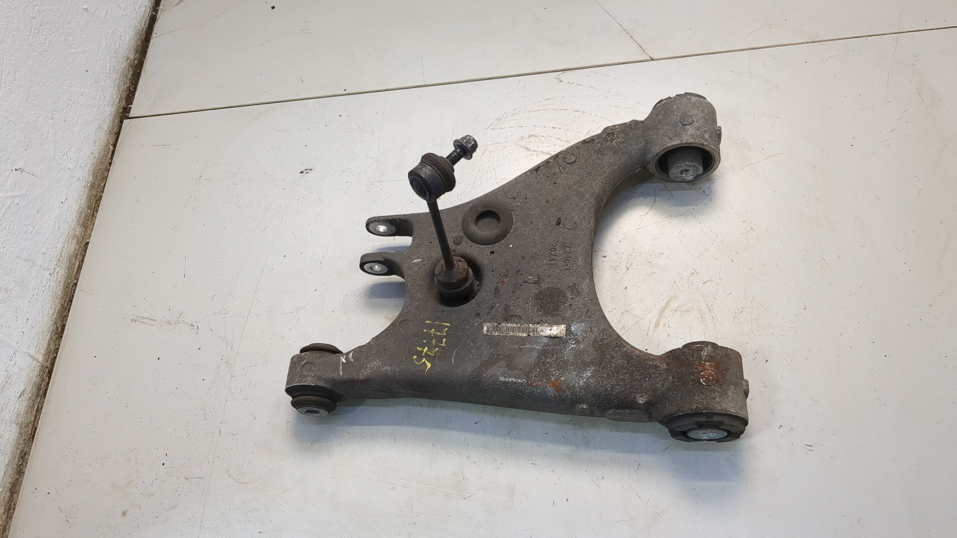 Рычаг задний левый