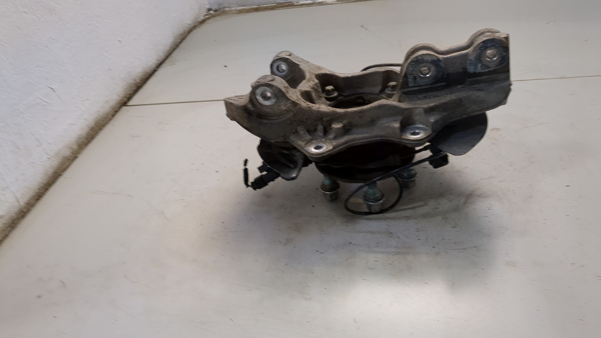 Кулак поворотный задний левый