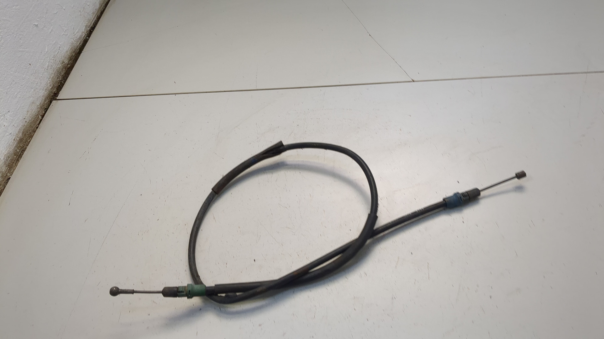 Трос стояночного тормоза