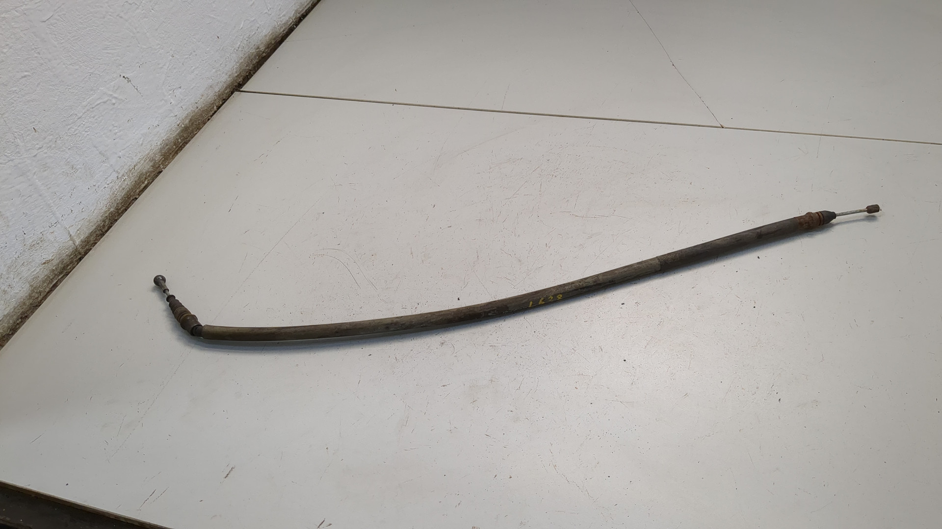 Трос стояночного тормоза