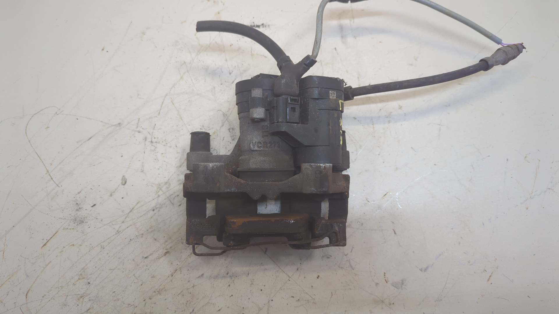 Суппорт задний левый