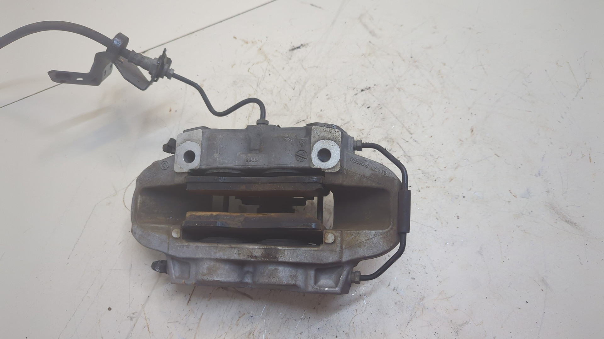 Суппорт передний левый