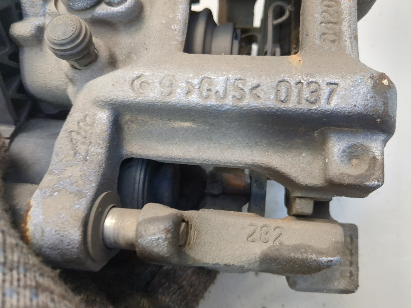 Суппорт задний левый