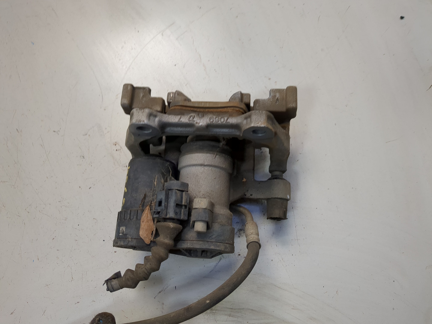 Суппорт задний левый