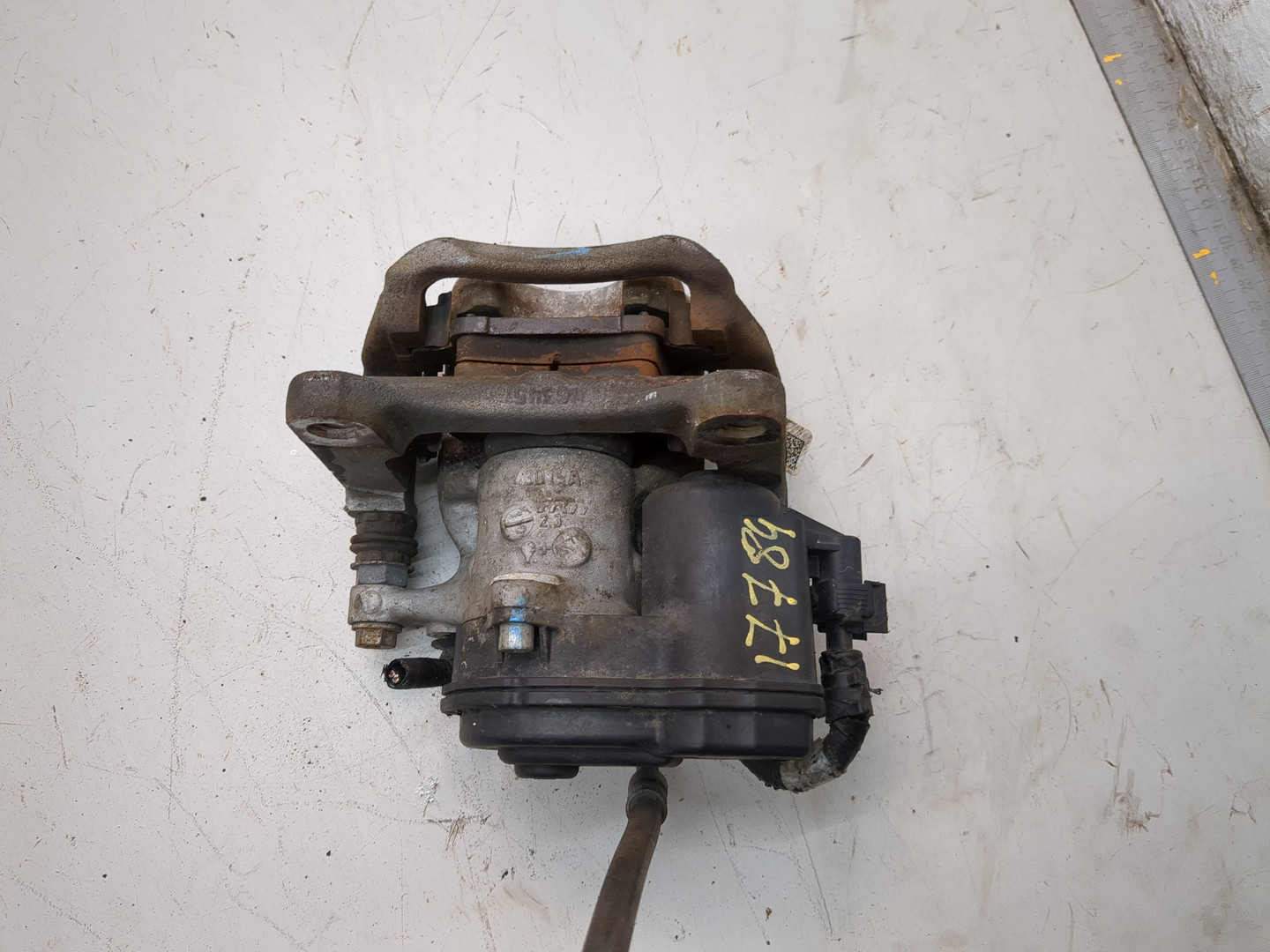 Суппорт задний левый