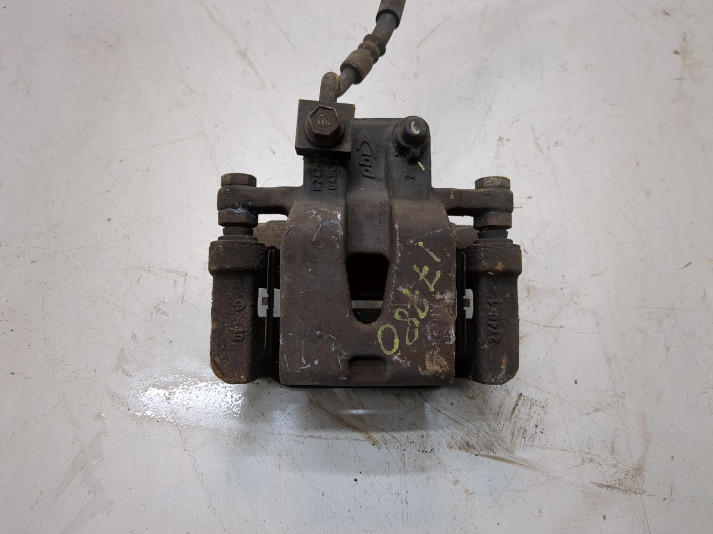 Суппорт задний левый