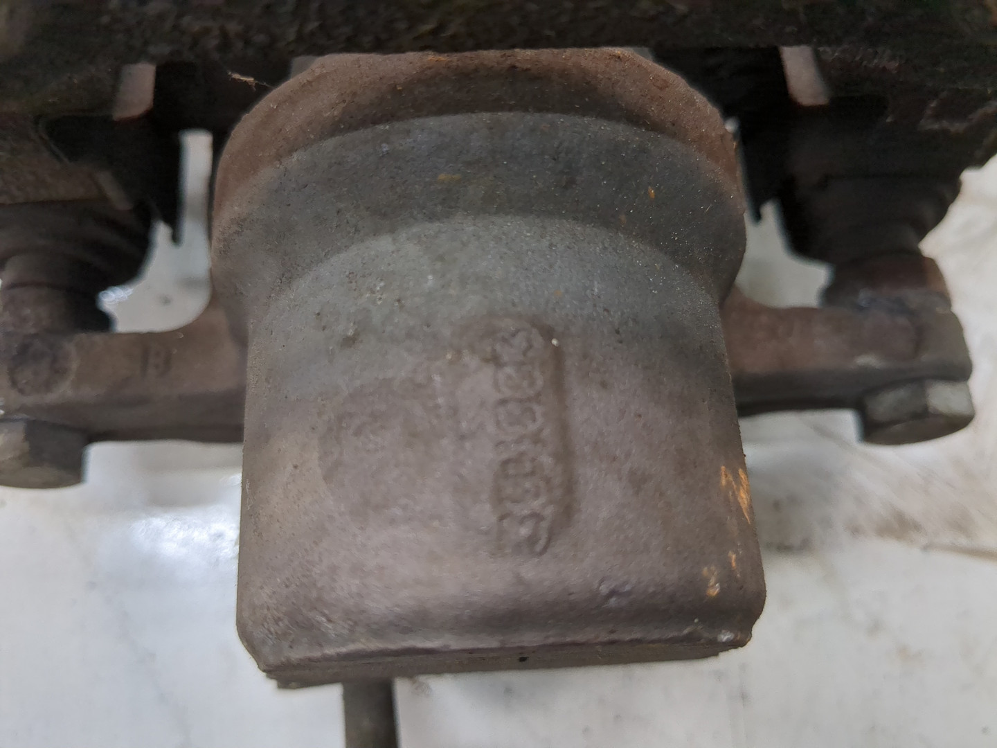 Суппорт задний левый