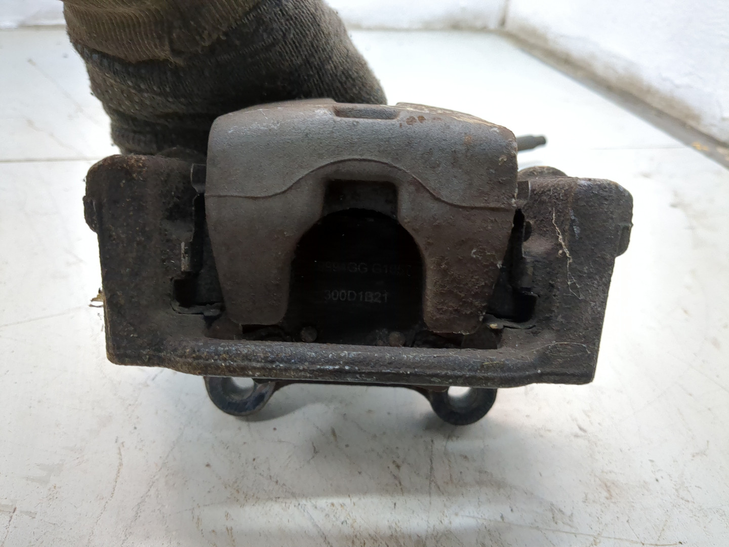 Суппорт задний левый