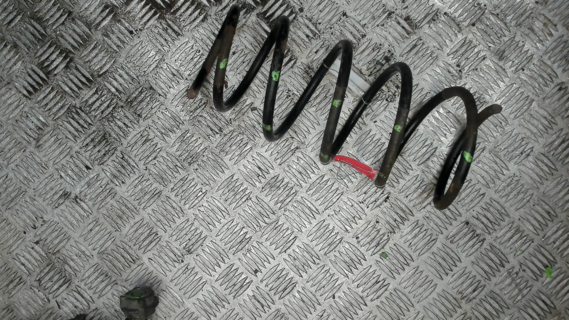 Пружина передняя