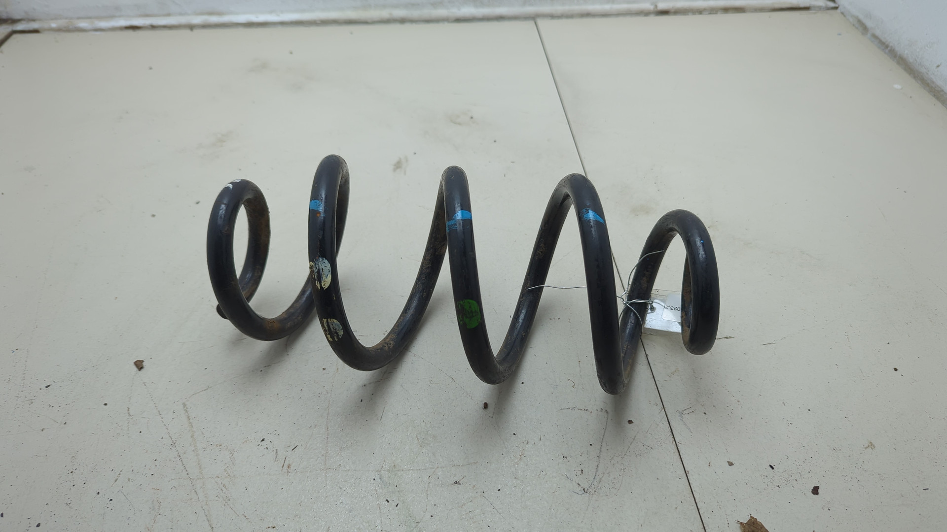 Пружина задняя