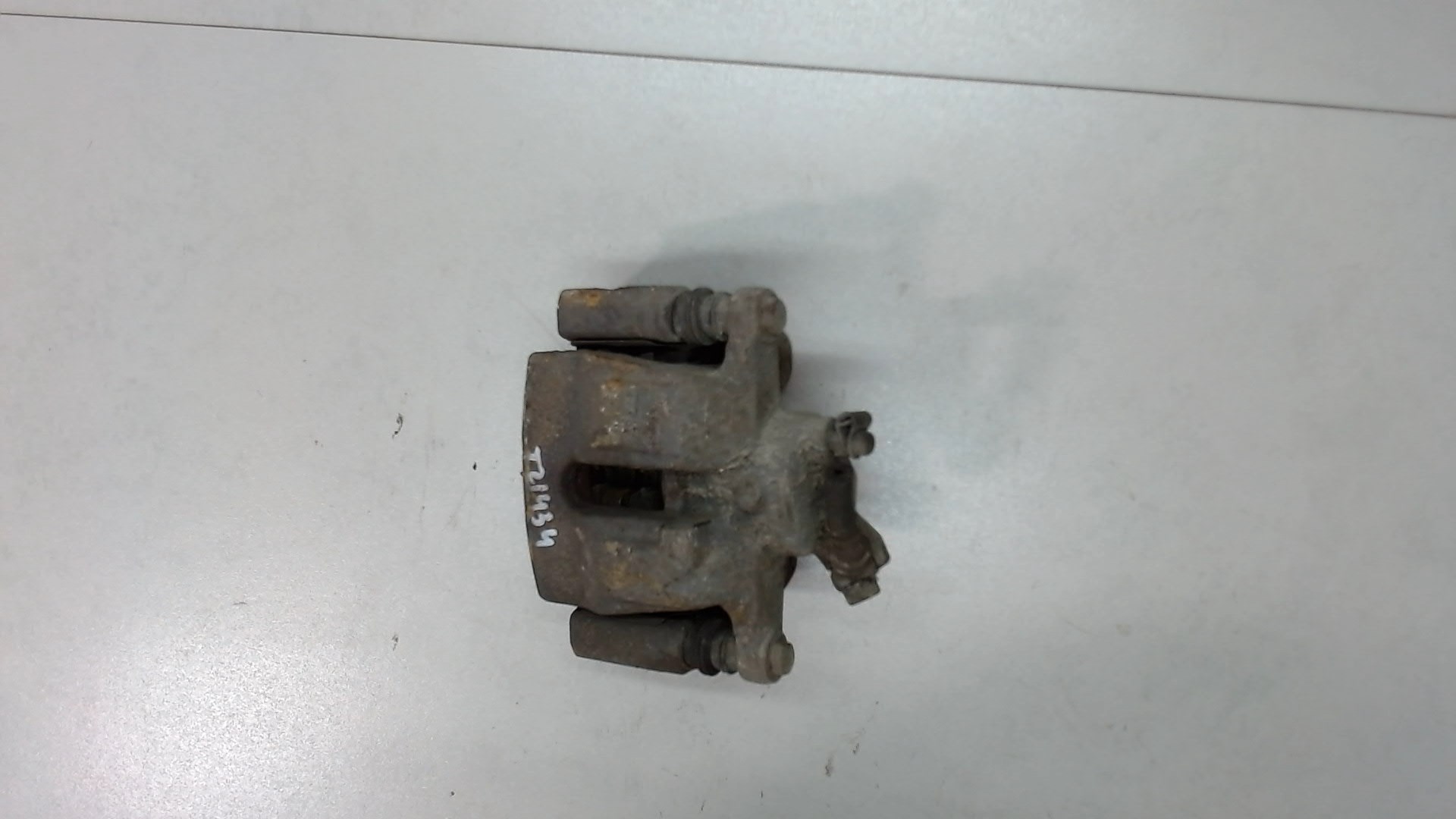 Суппорт задний левый