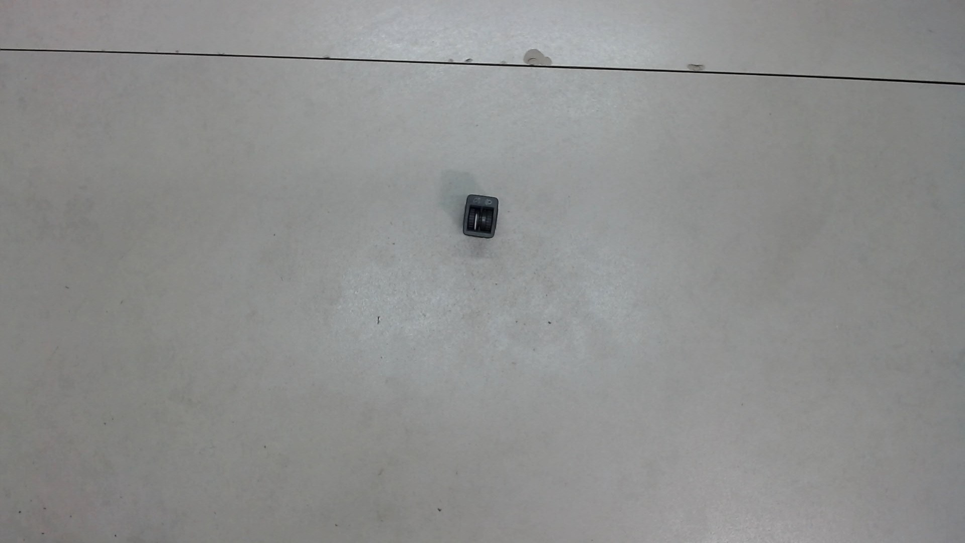 Кнопка корректора фар