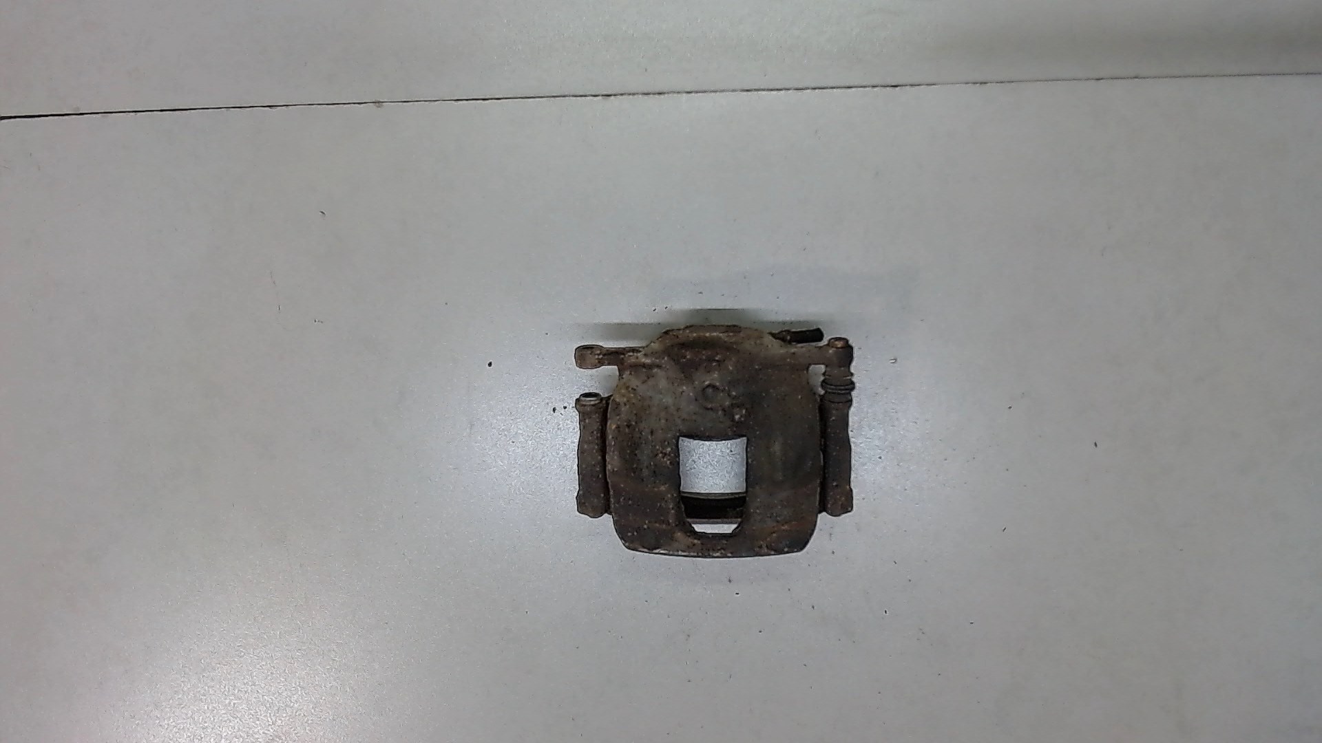 Суппорт передний левый