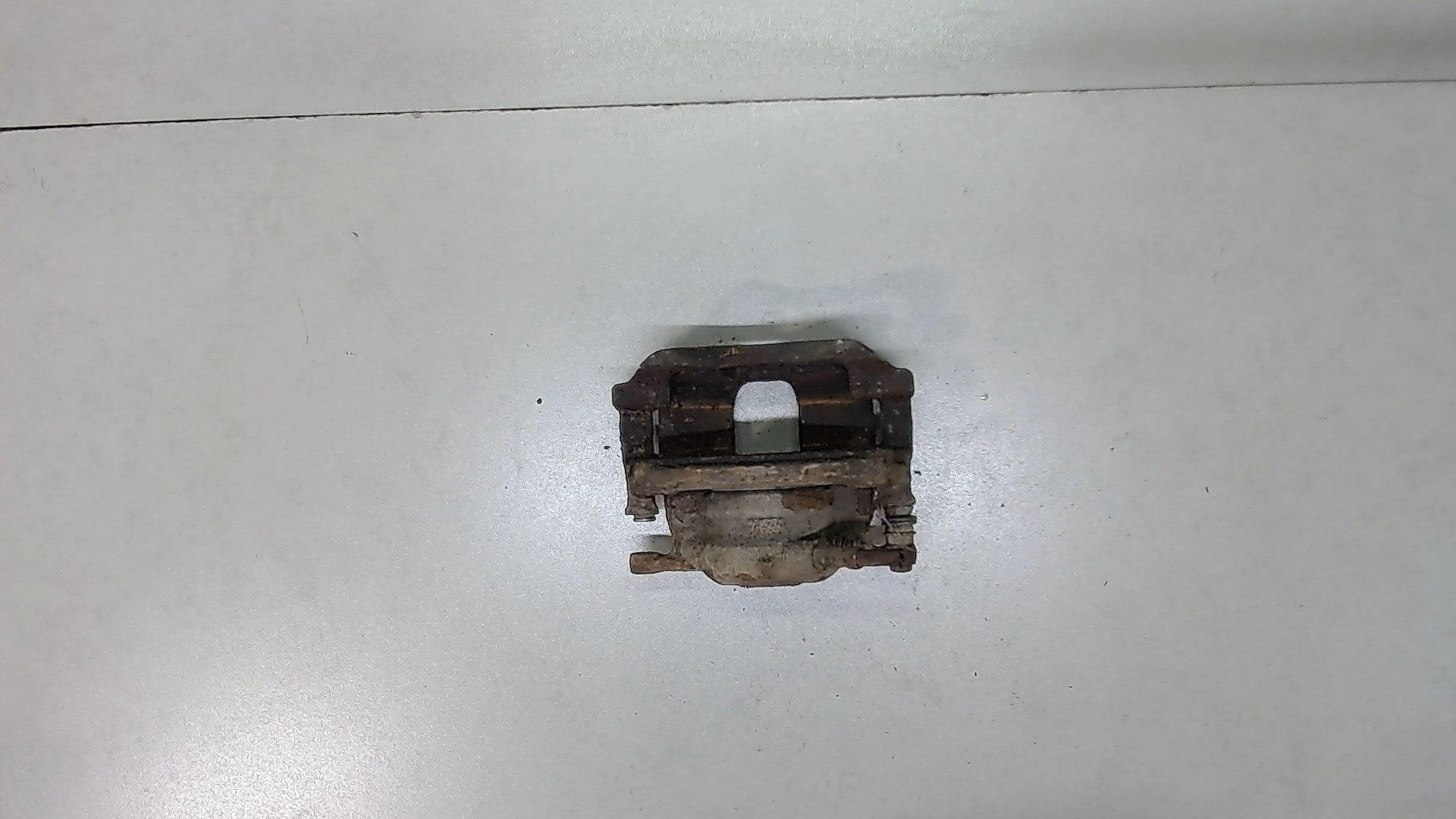 Суппорт передний левый