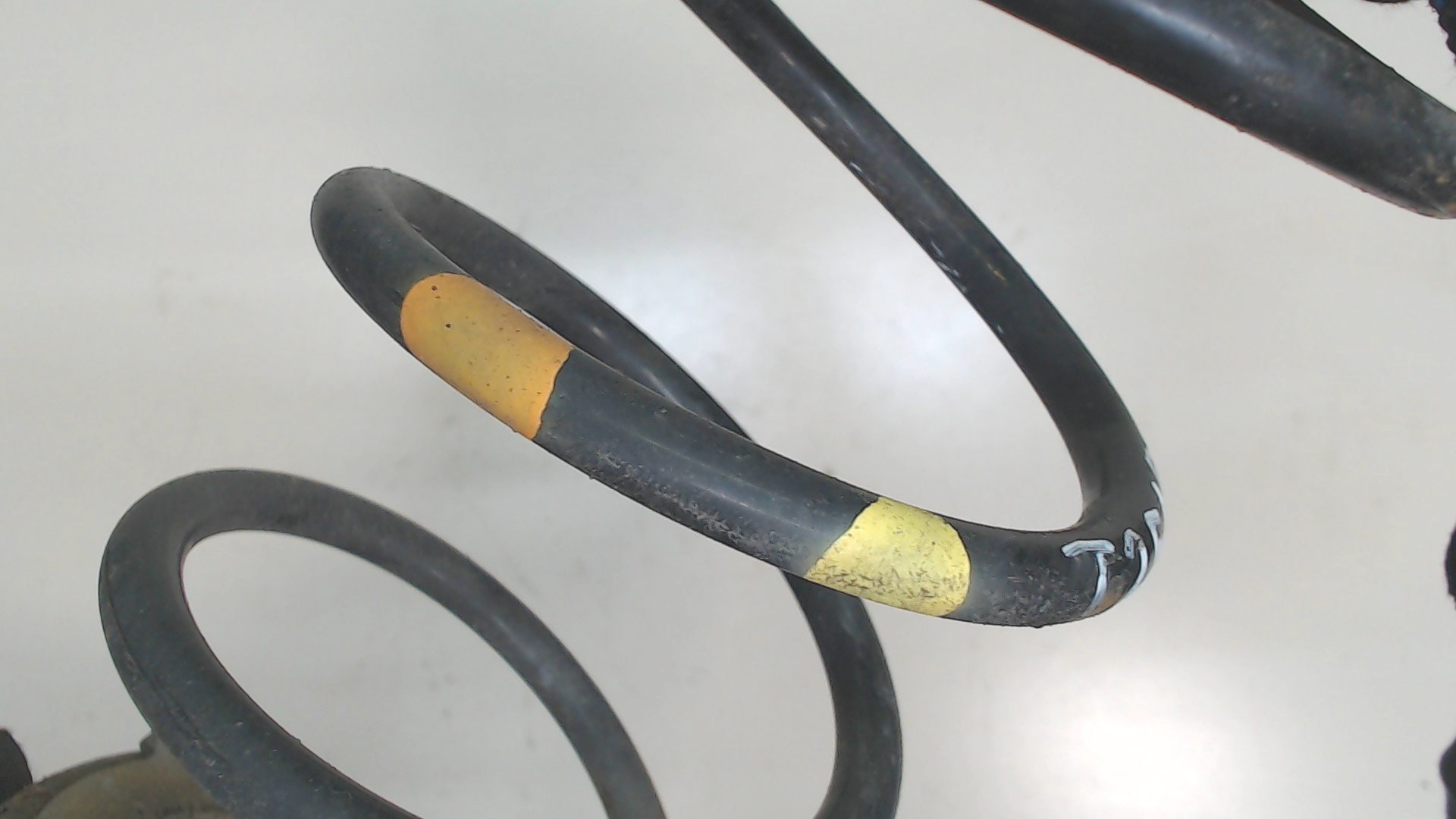 Пружина задняя