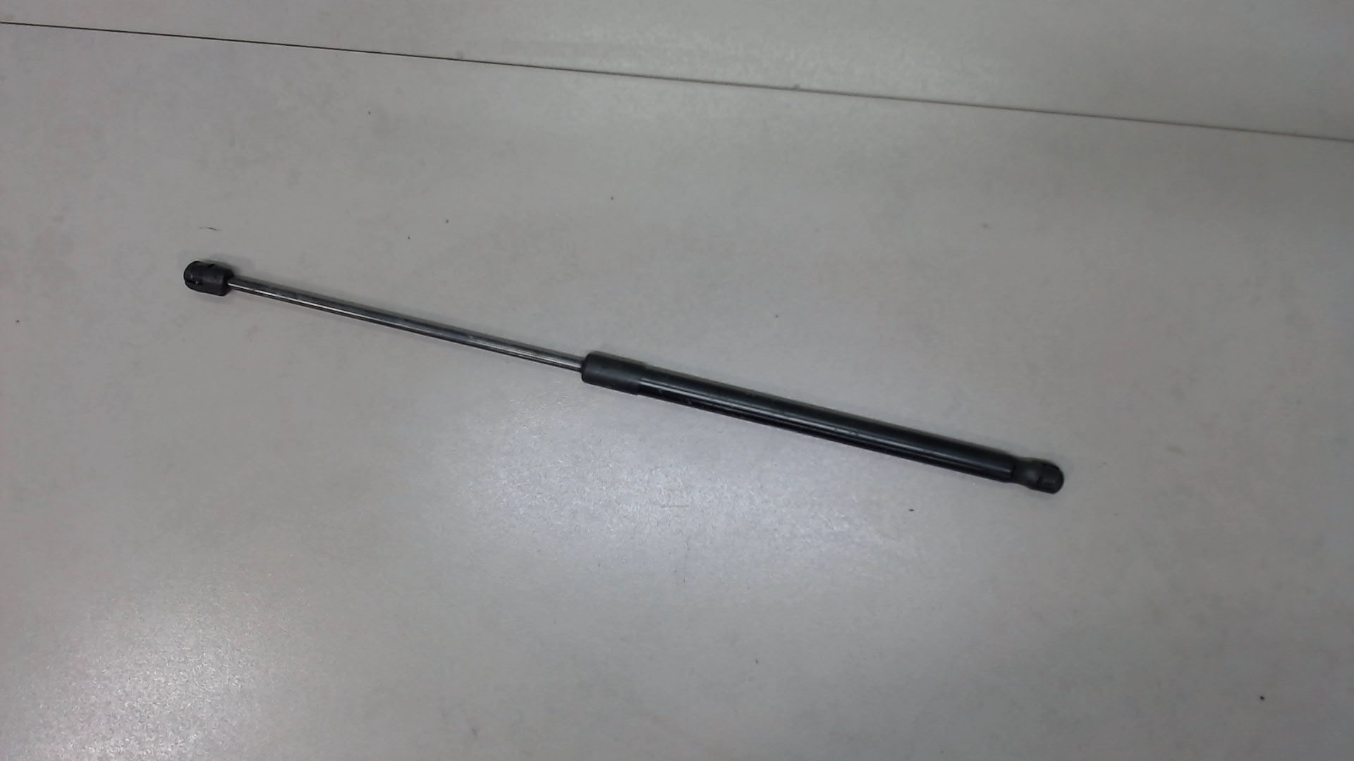 Амортизатор крышки багажника