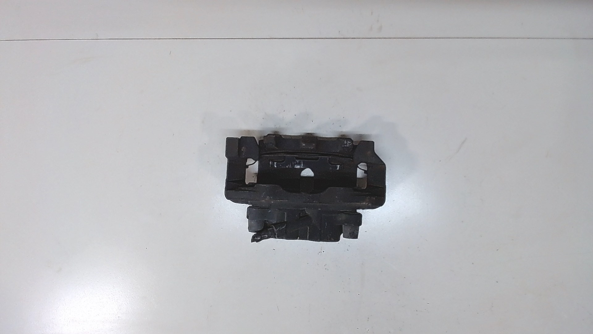 Суппорт передний левый