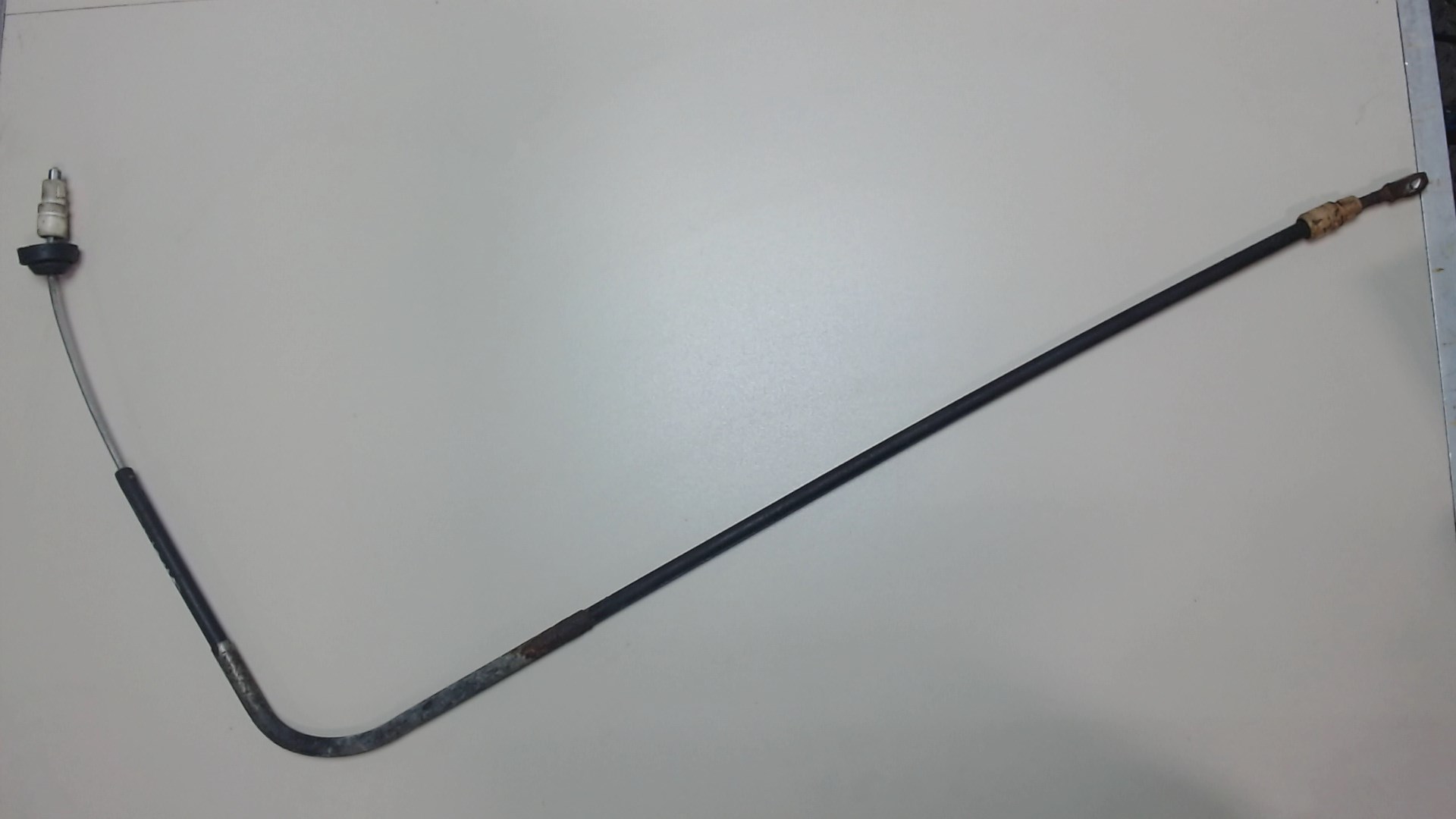 Трос стояночного тормоза