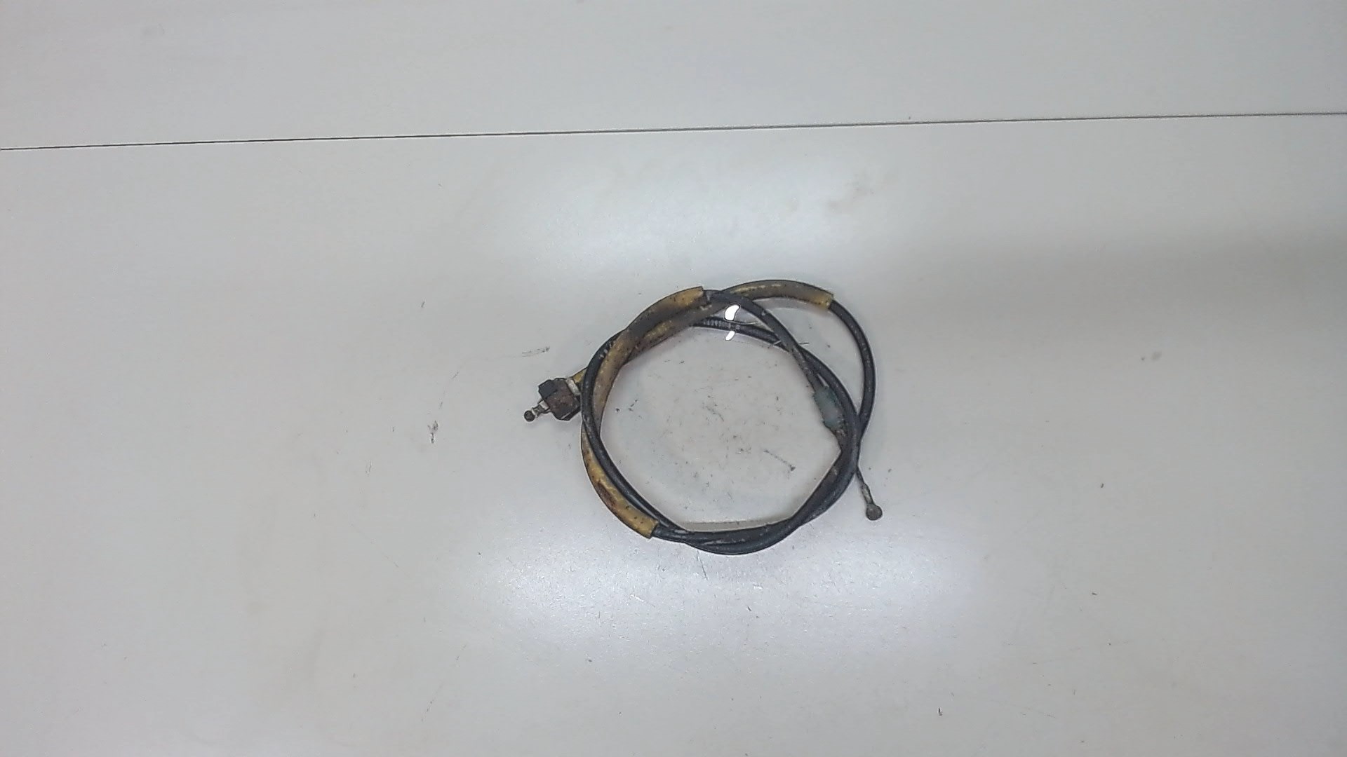 Трос стояночного тормоза