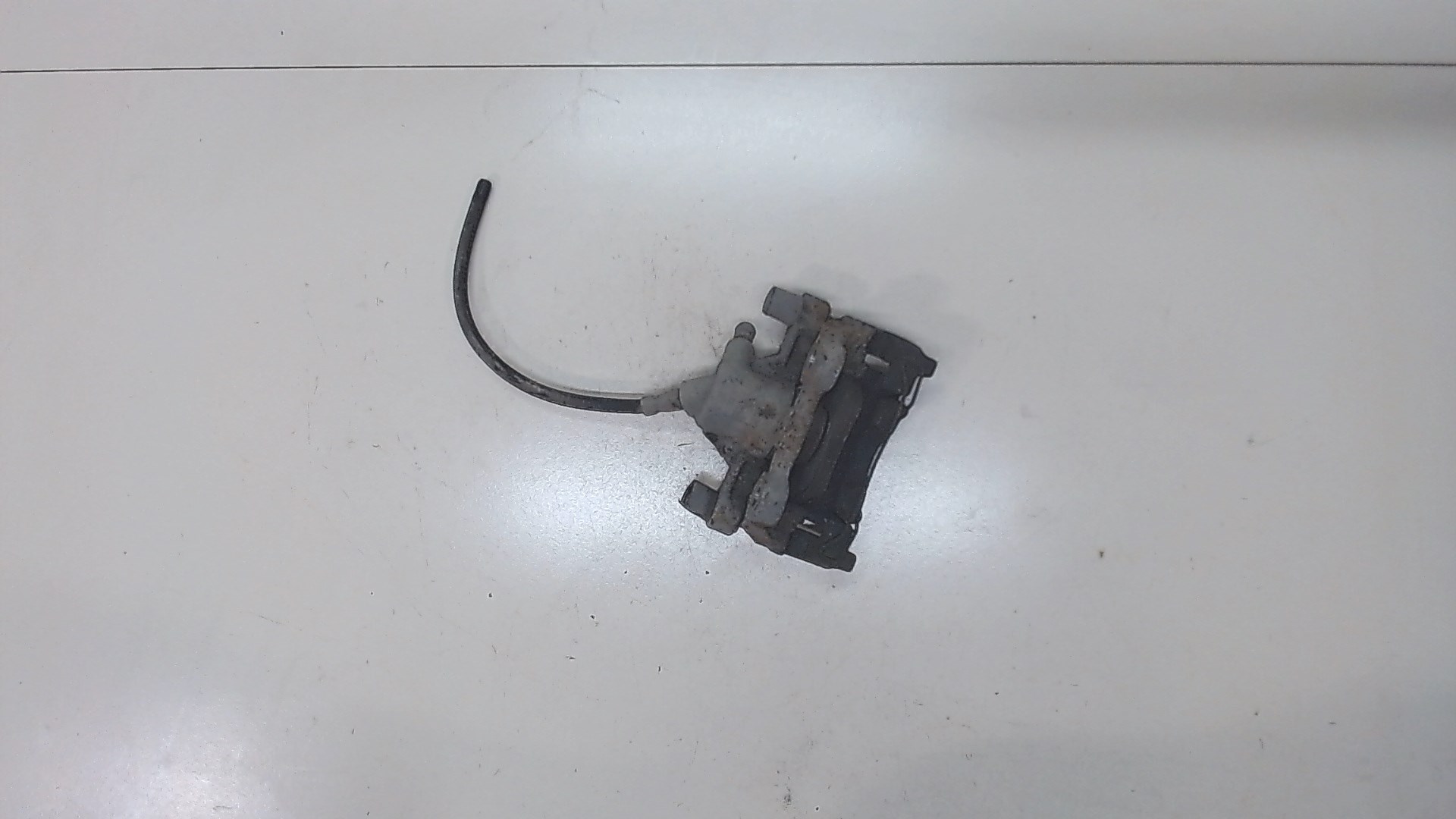 Суппорт задний левый