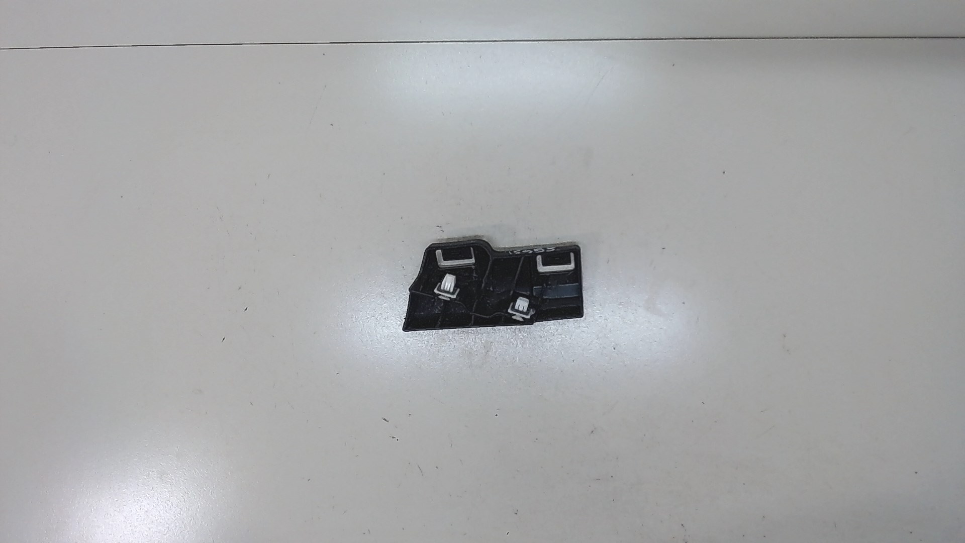 Кронштейн заднего бампера левый