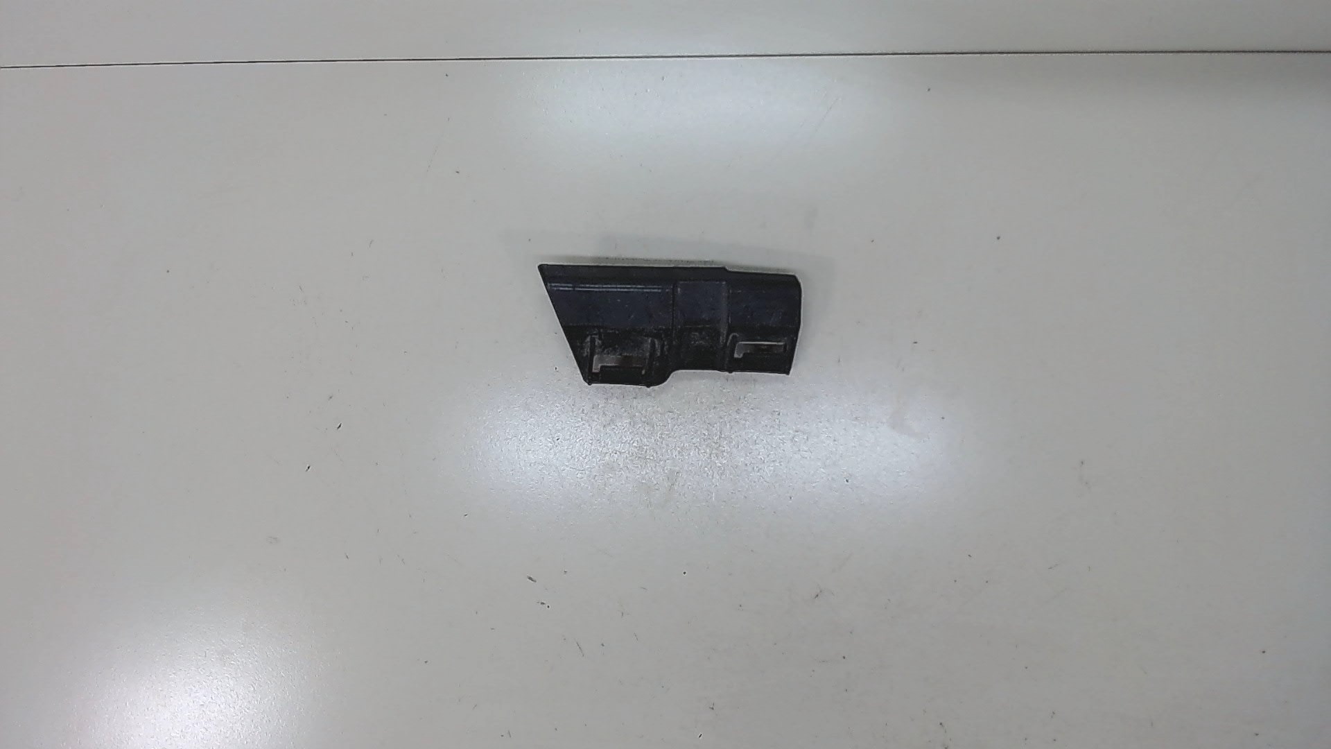 Кронштейн заднего бампера левый