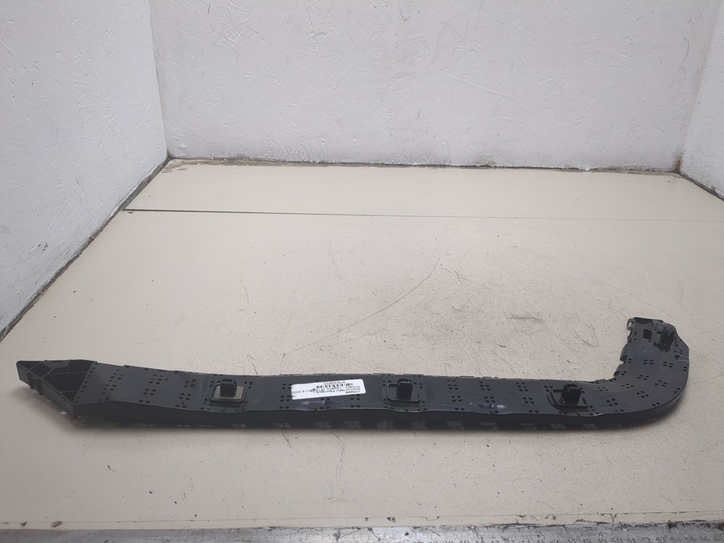 Кронштейн переднего бампера правый