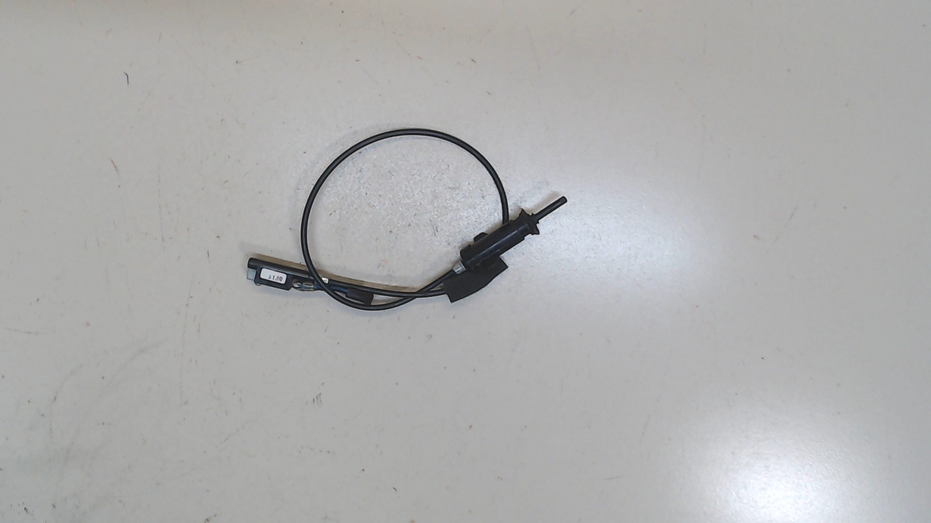 Трос лючка бензобака